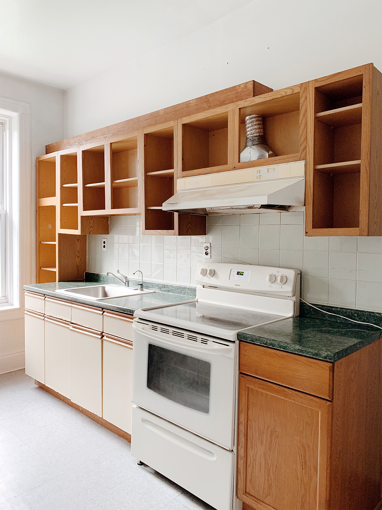 before photo of a dated kitchen