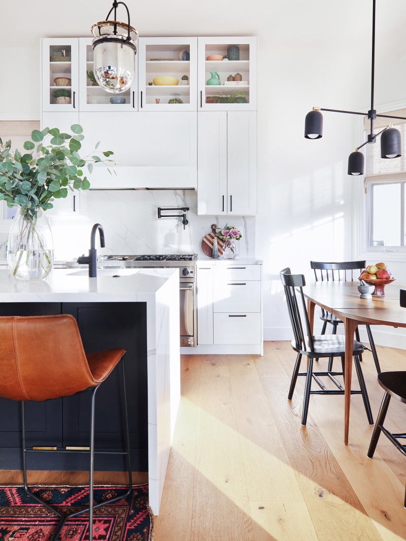 white modern kitchen with black island