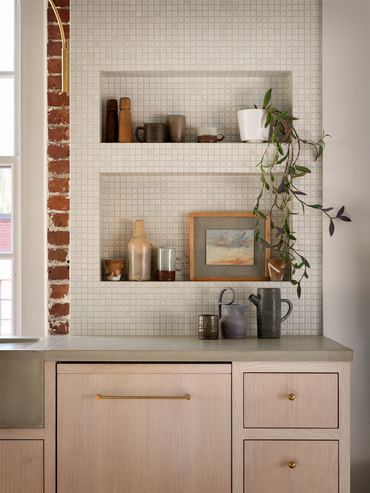 kitchen nook with vases and photos