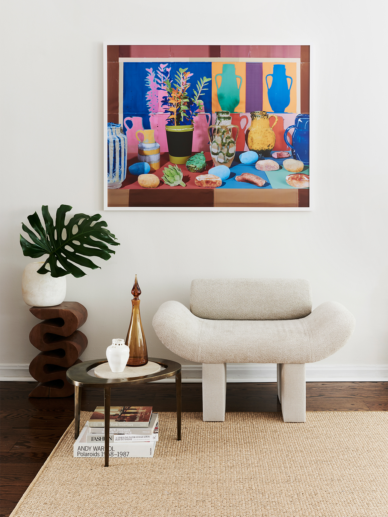 colorful artwork beige armchair