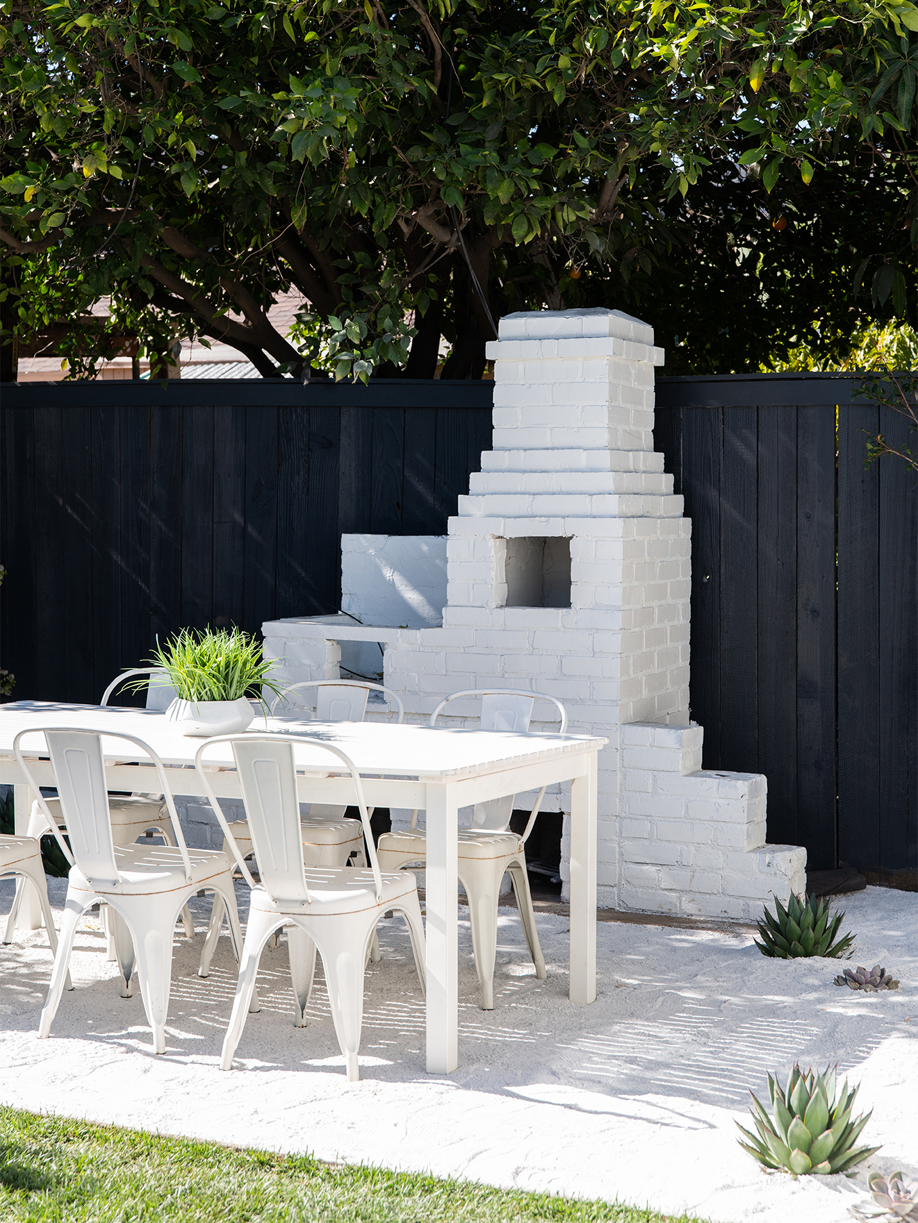 white backyard dining area