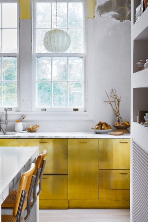 Brass Cabinets and a Few Lucky Surprises Made This Century-Old Home Truly Shine