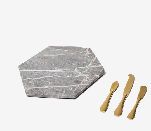  grey hexagonal marble cheese board and brass utensils