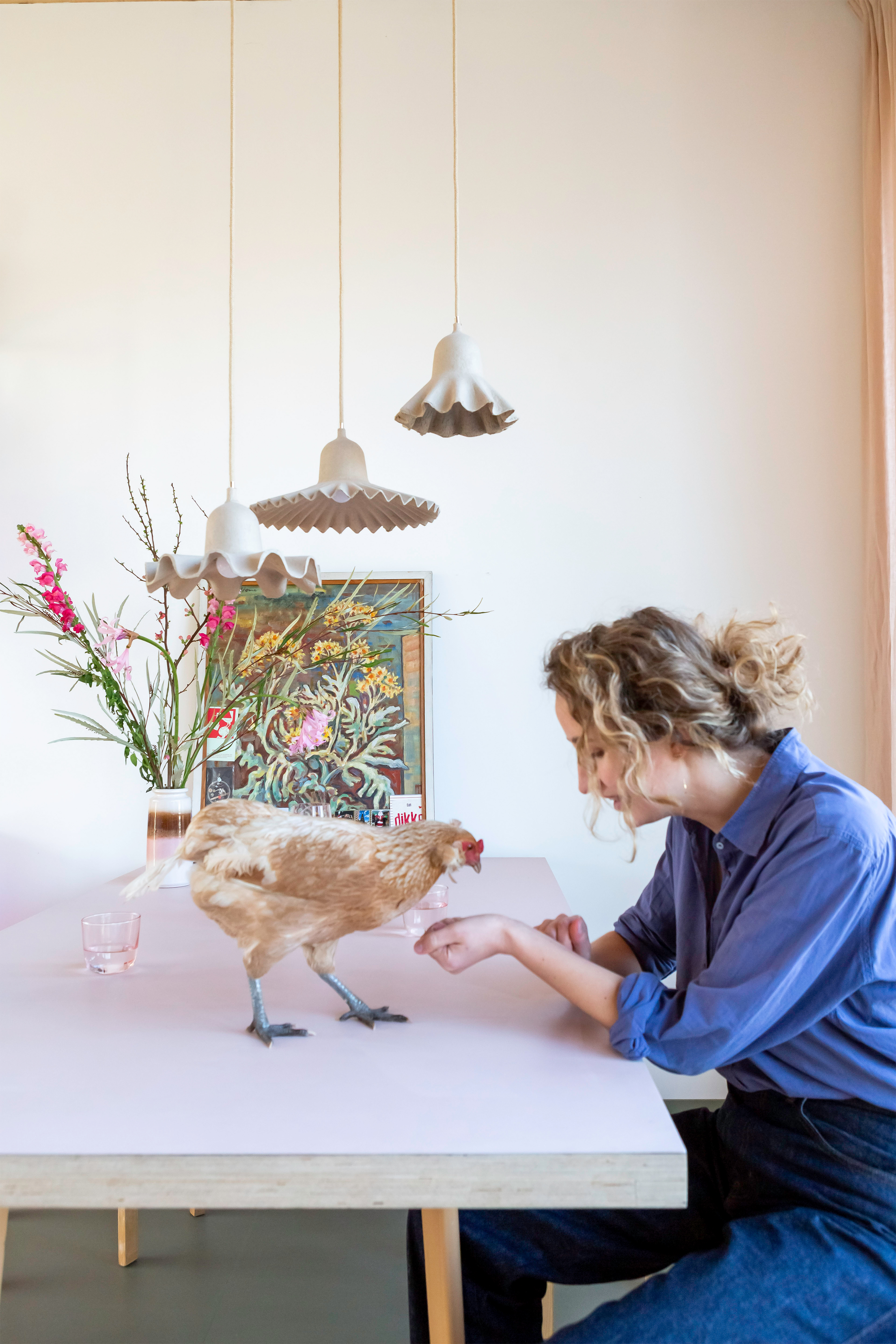 Foekje Fleur with her pet chicken