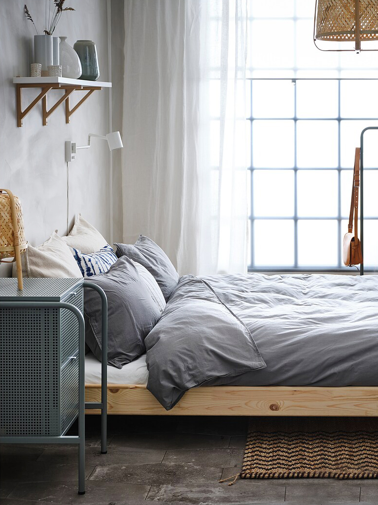 Bedroom with blue nightstand