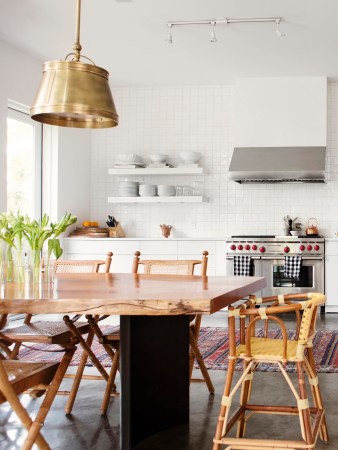 White kitchen with live edge table