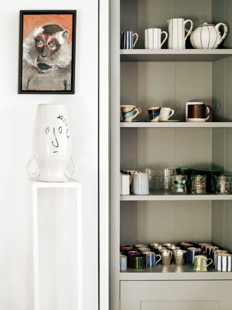 gray kitchen cabinet with no glass doors