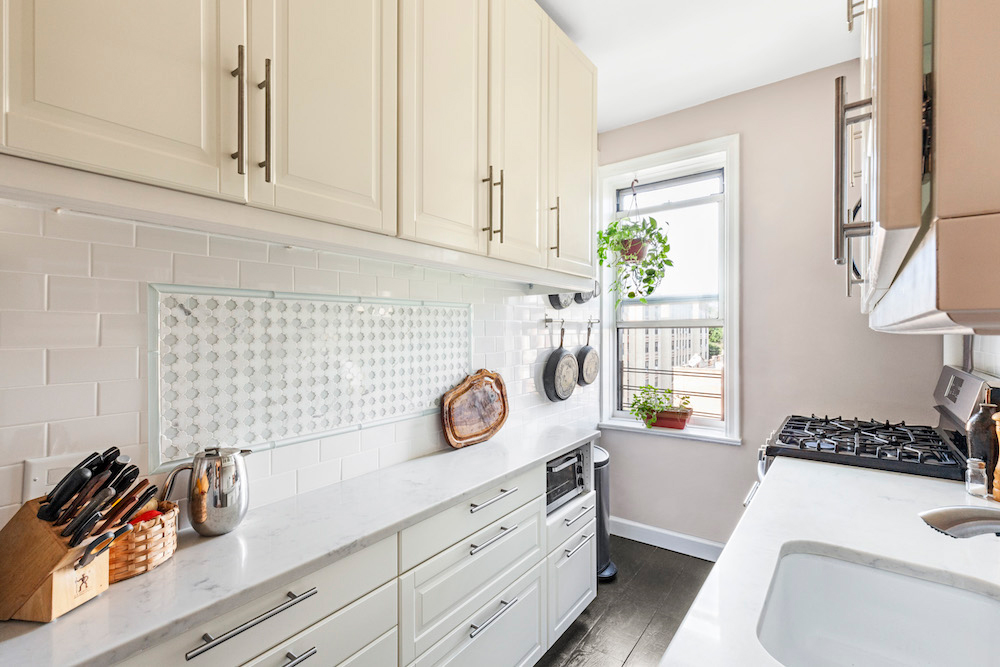 Kitchen with reclaimed floors and backsplash