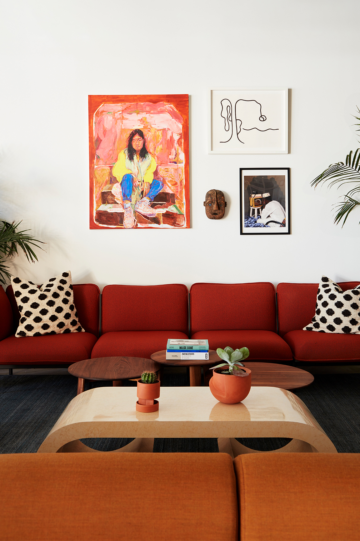 living room with red sofa