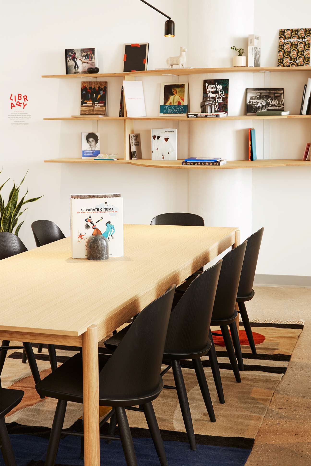 dining table with floating wall shelves