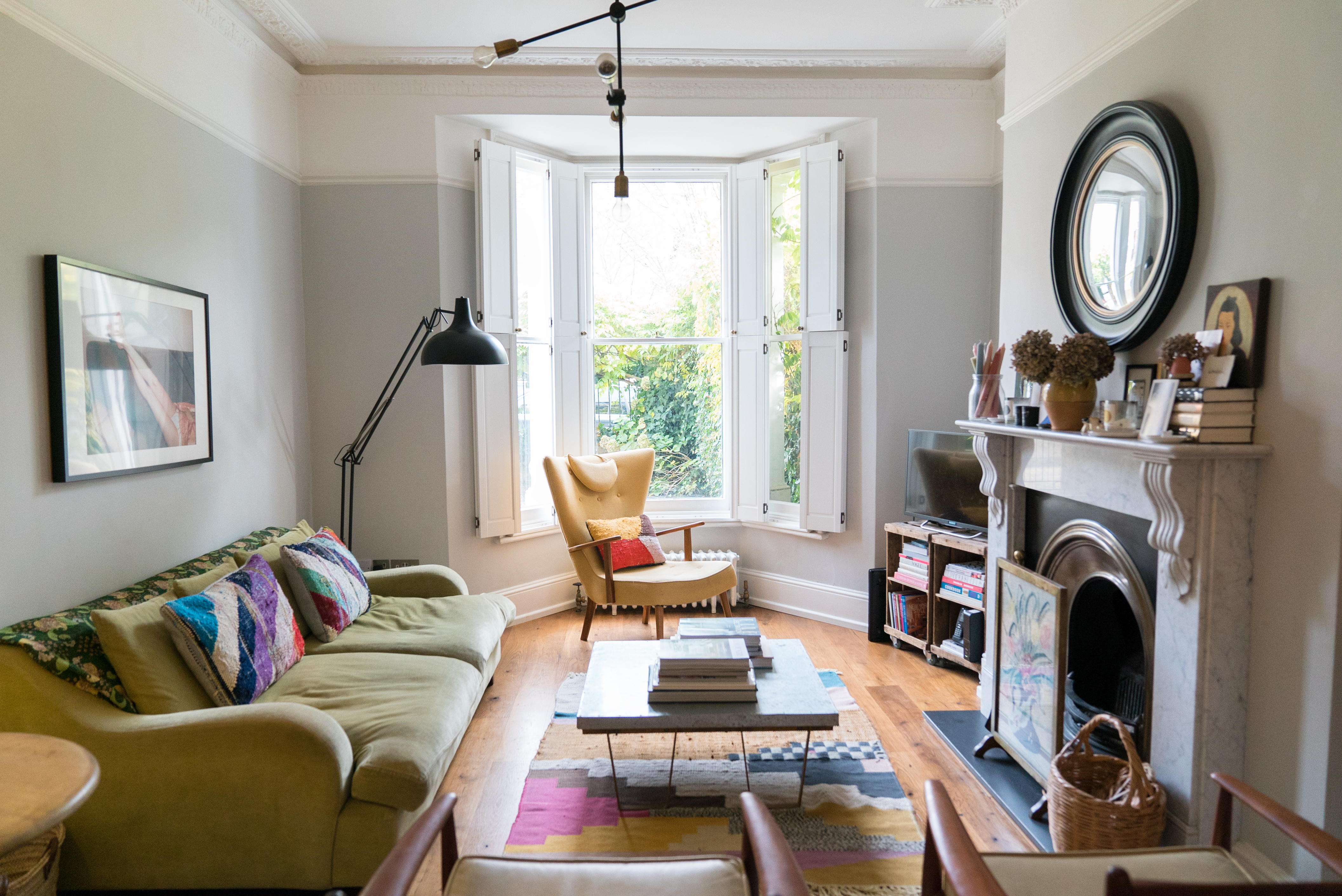 Living room with green sofa