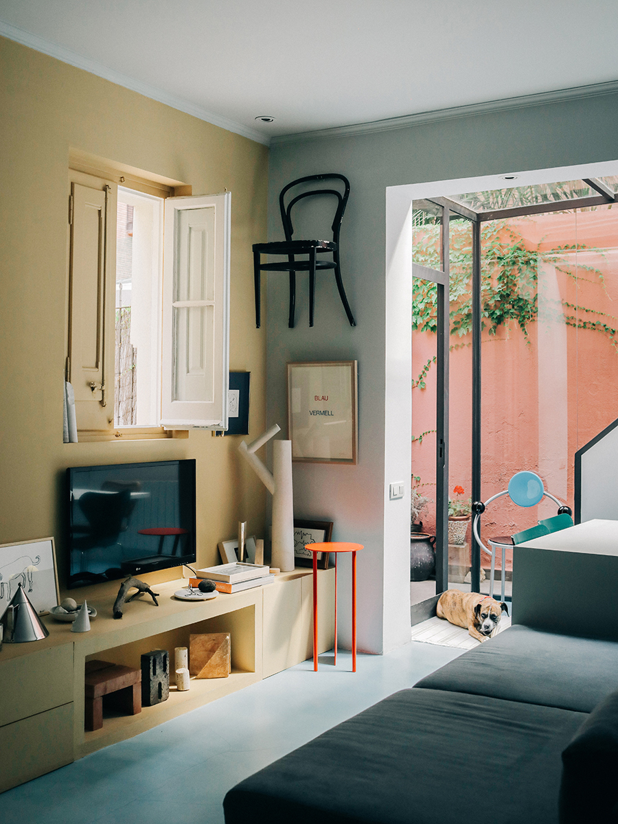 living room with chair mounted on wall