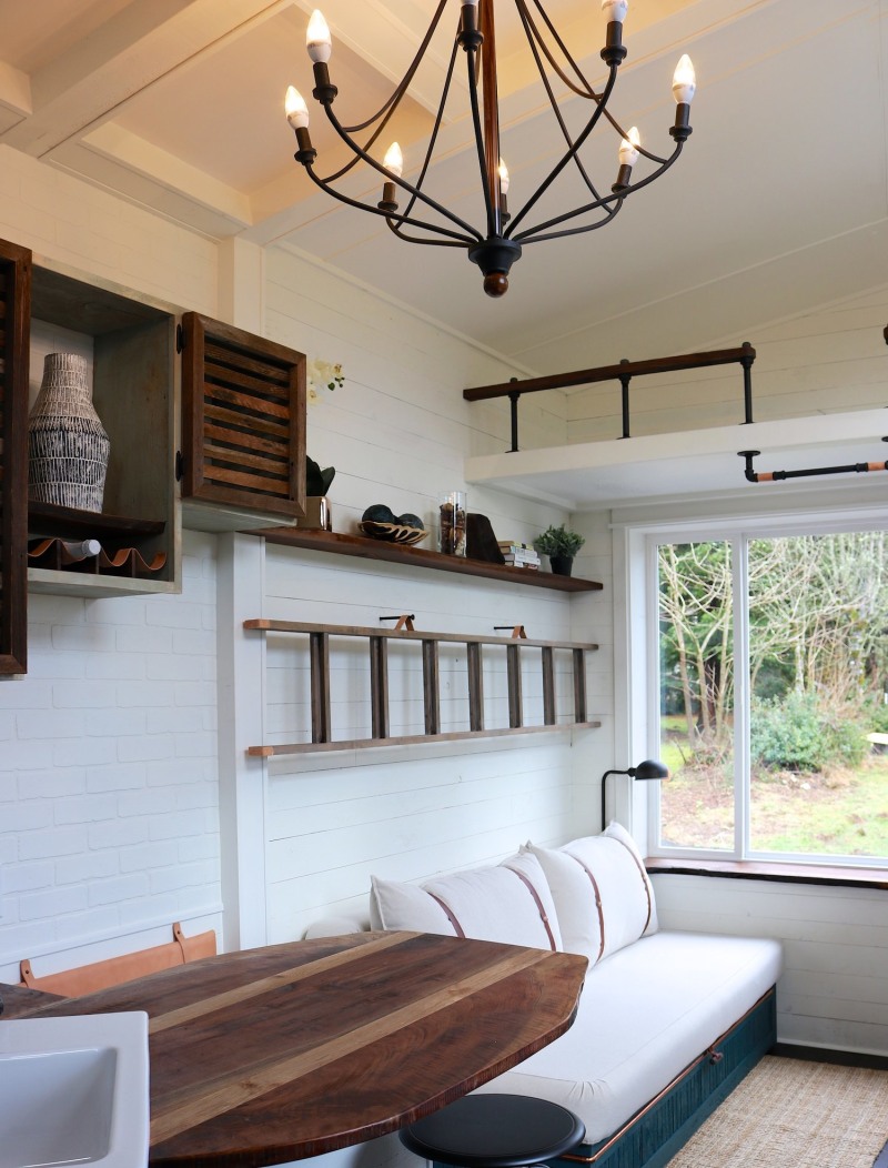 TIny home interior with white bench