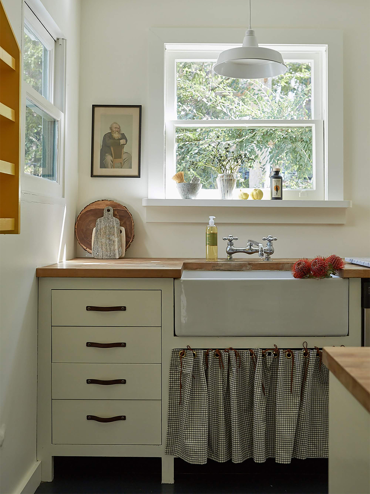 Farmhouse kitchen with sink skirt