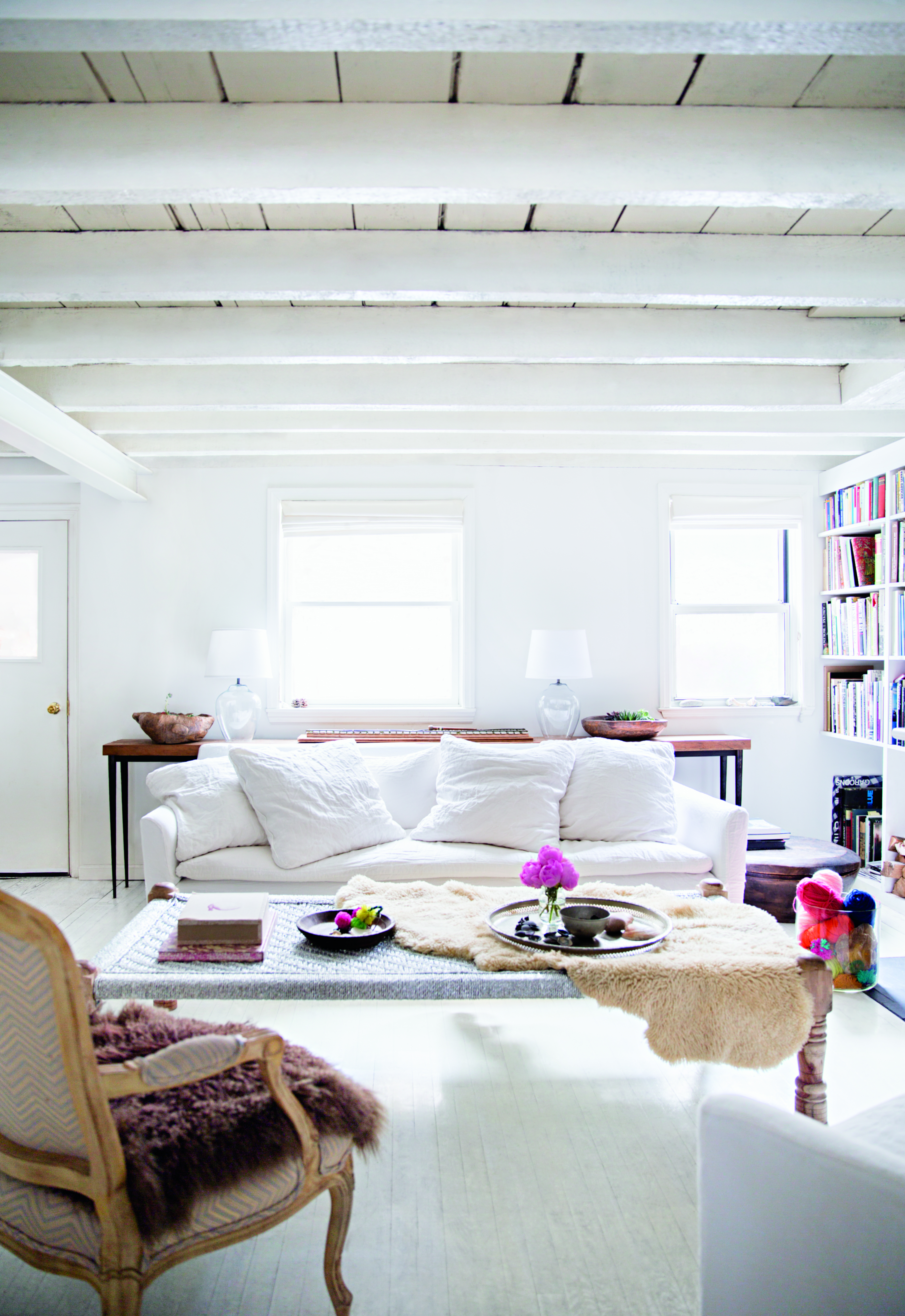 whitewashed living room with exposed beams
