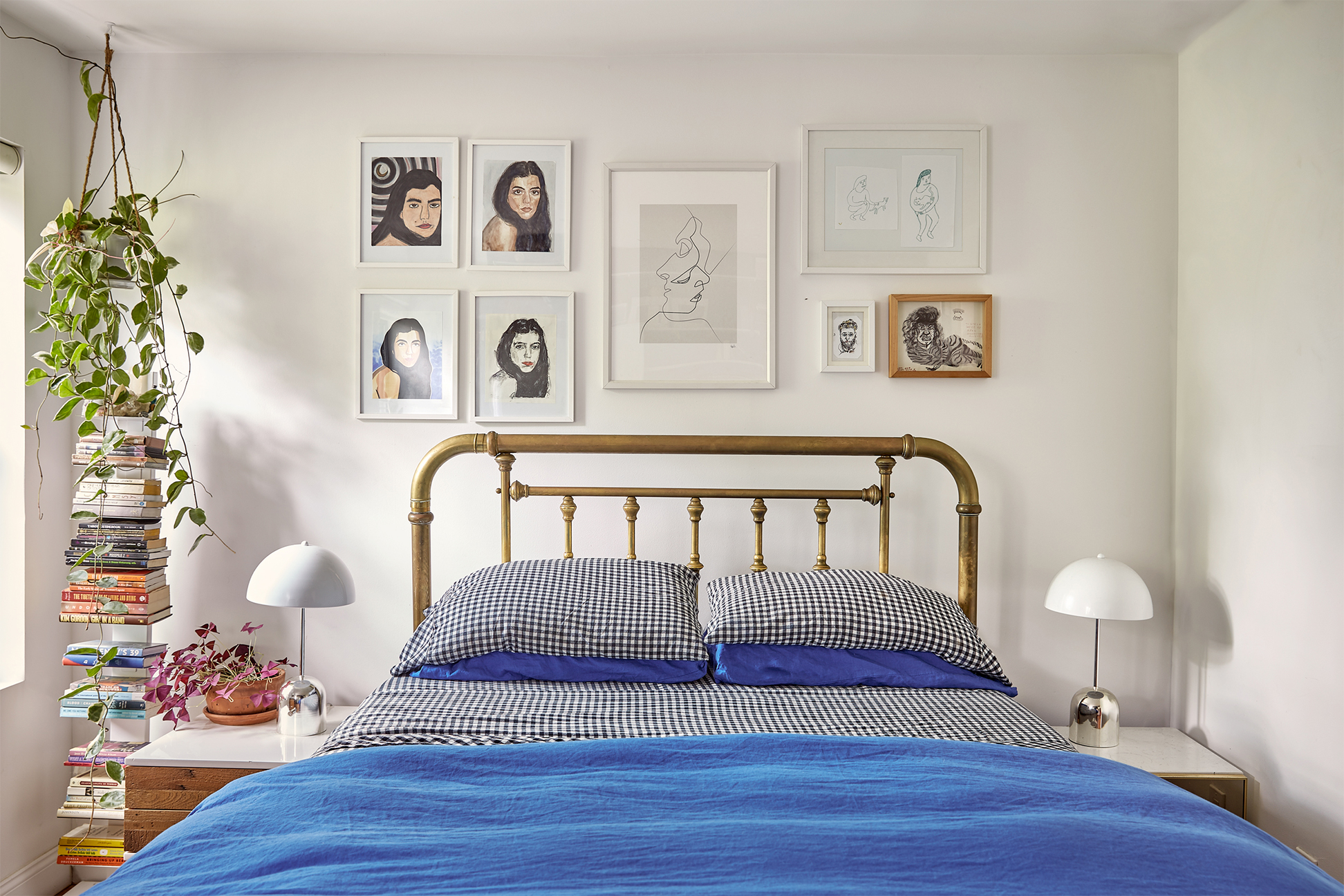 Bedroom with brass bed and blue quilt