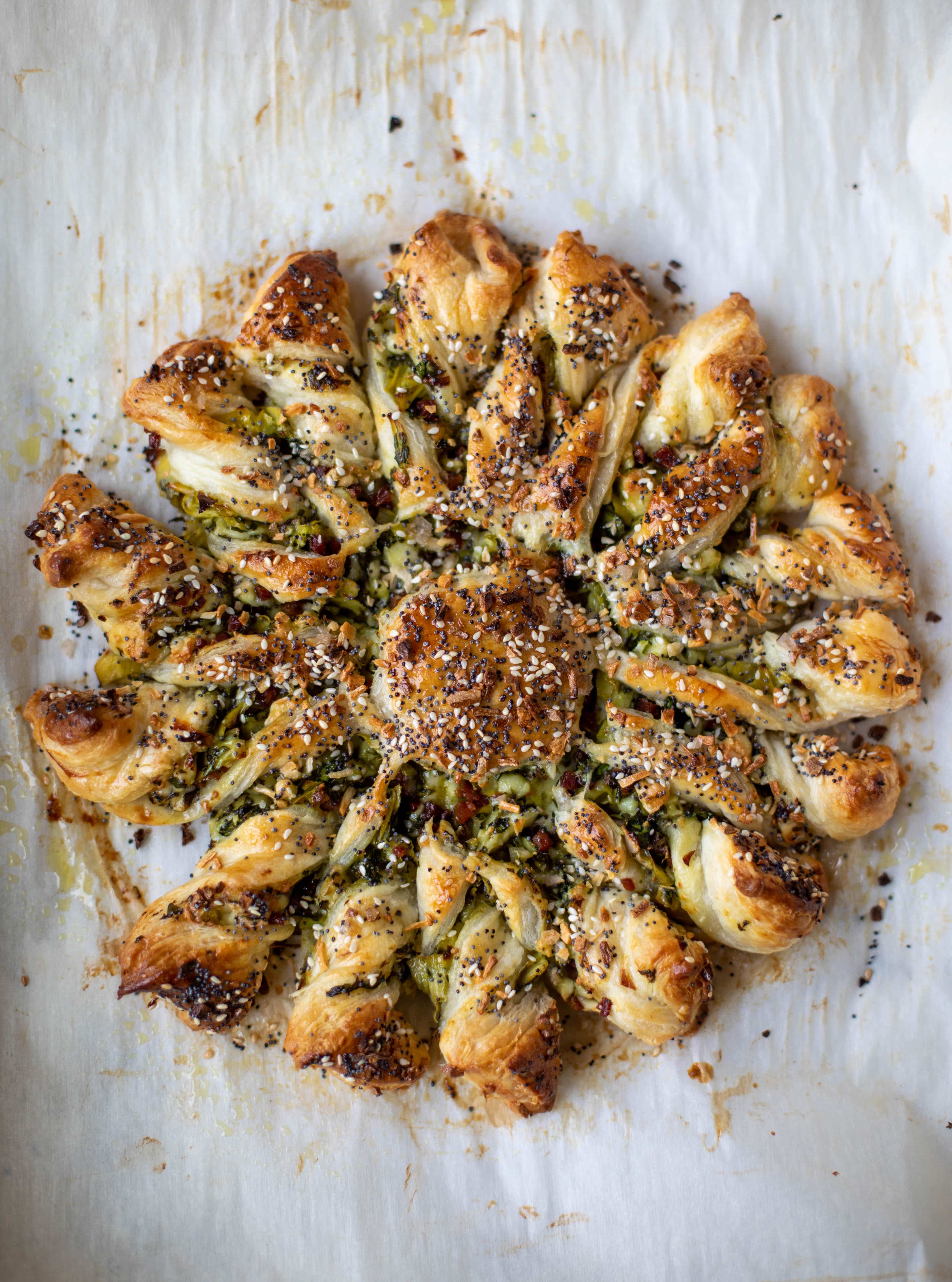 circle of bread with seeds on it