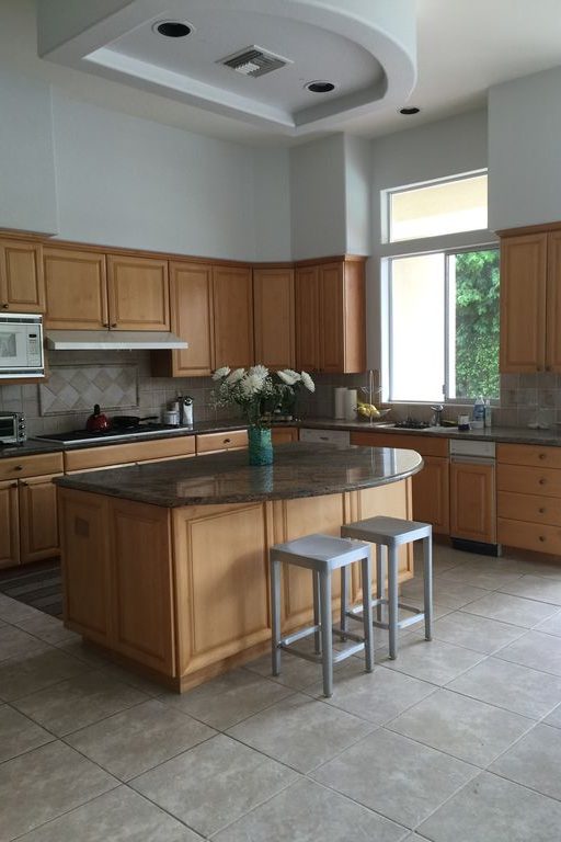 old kitchen with wood cabinets