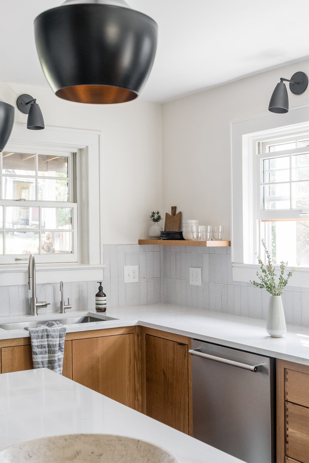 wood cabinets with white counters