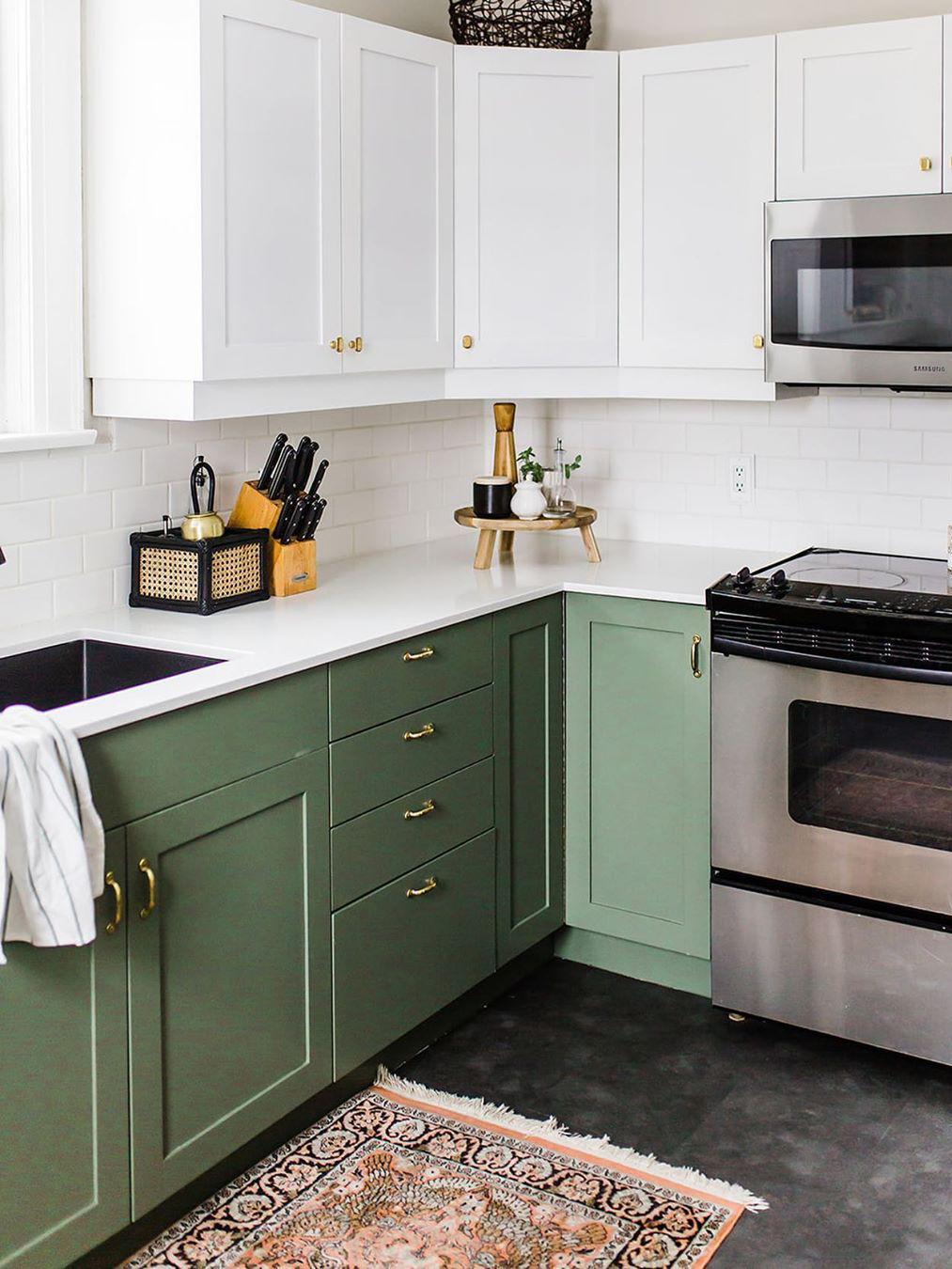 green lower and white upper cabinets