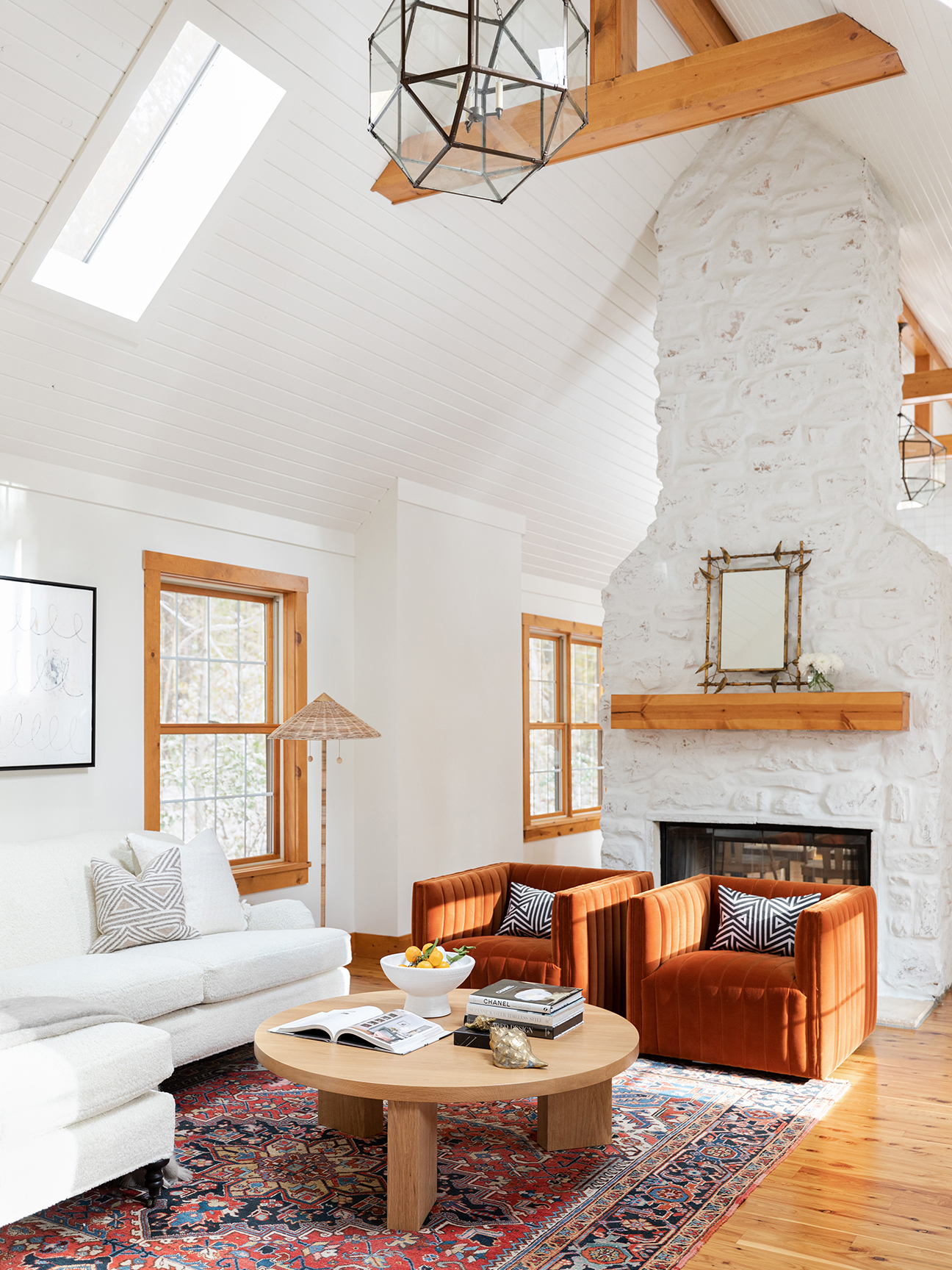 white a-frame living room with fireplace