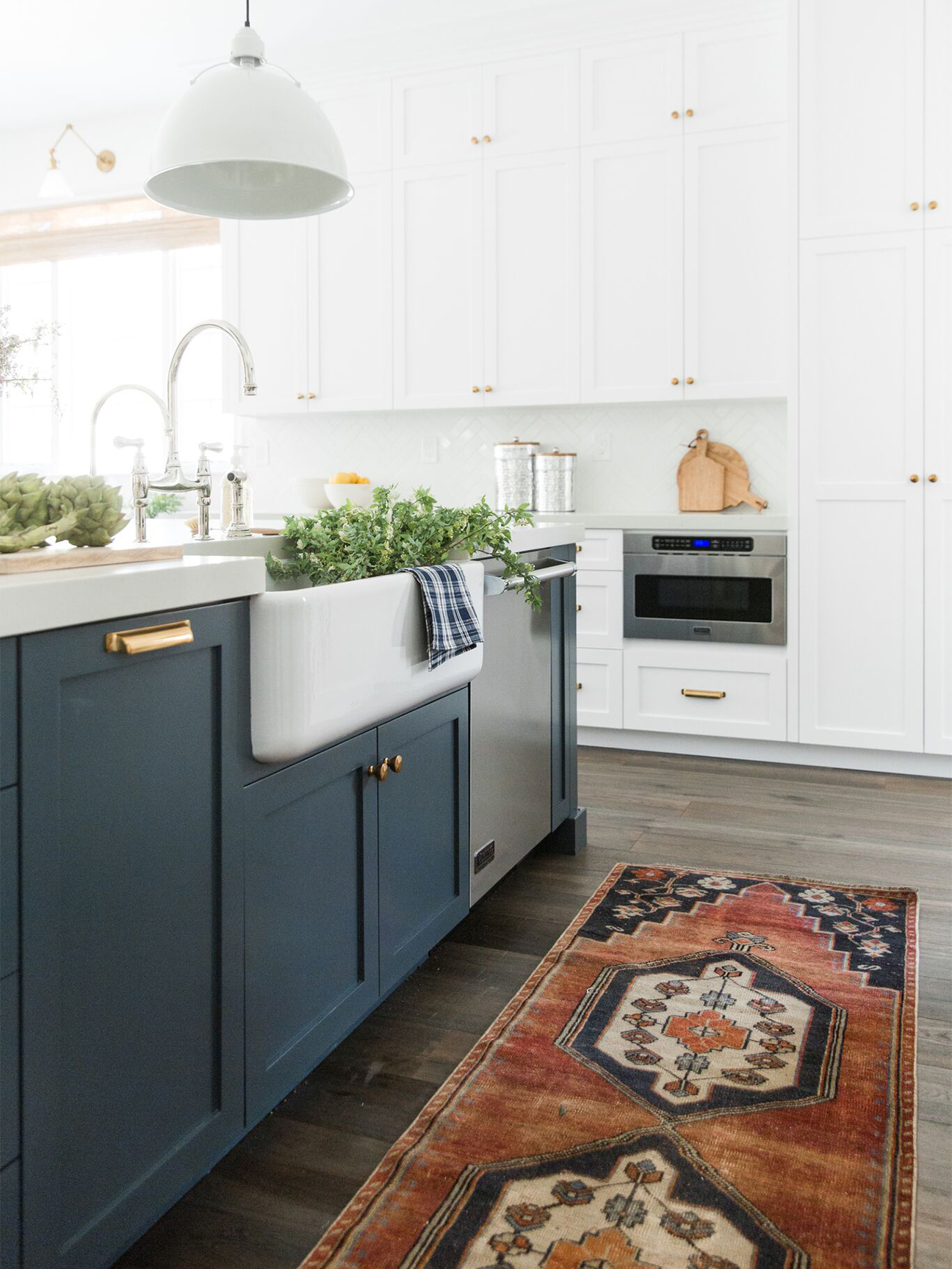 Blue and white kitchen with vintage runner