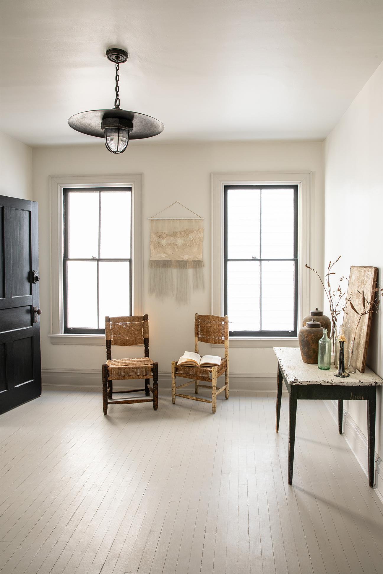 open living room with white floors