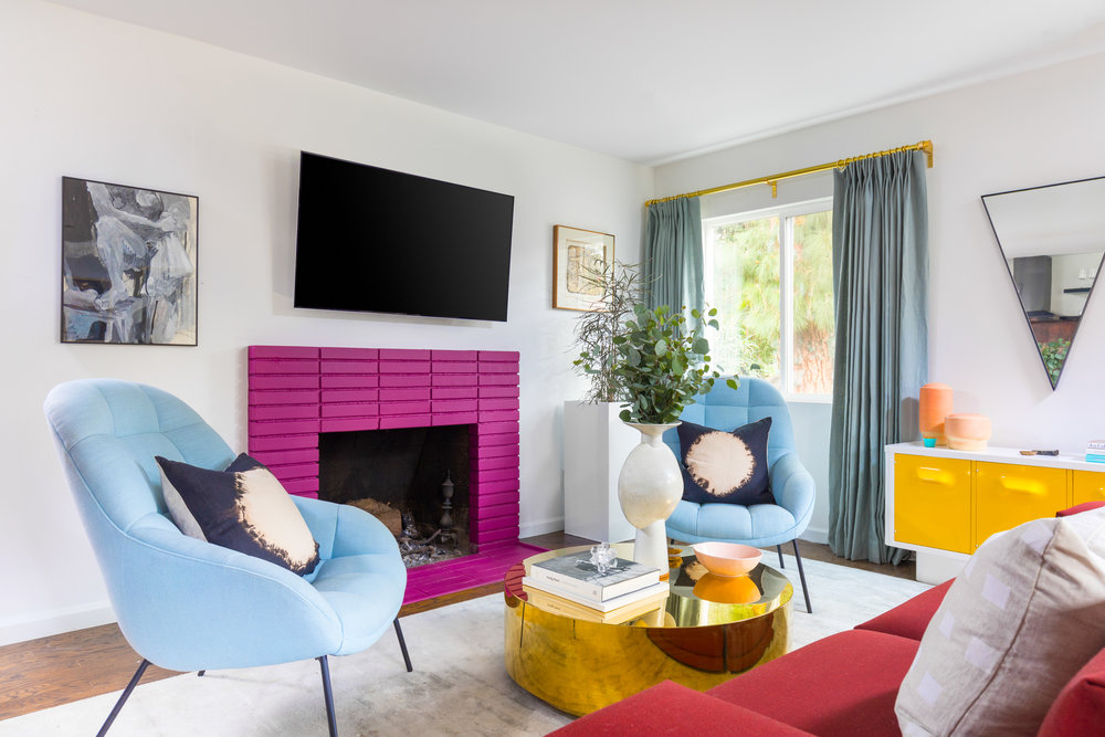 bright pink fireplace in white living room