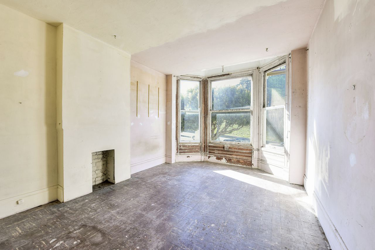 open empty room with large bay window