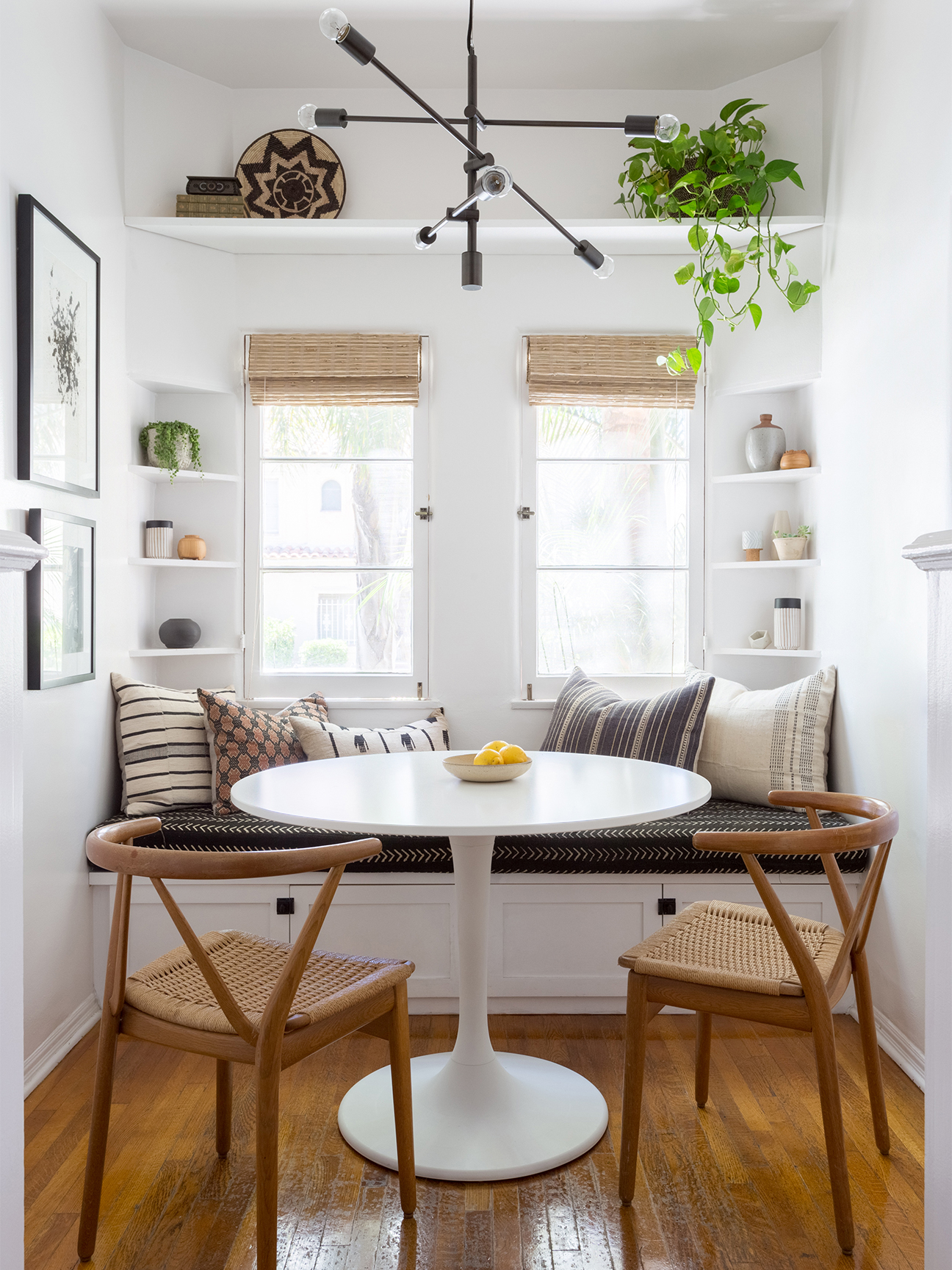 two chairs facing a built in bench