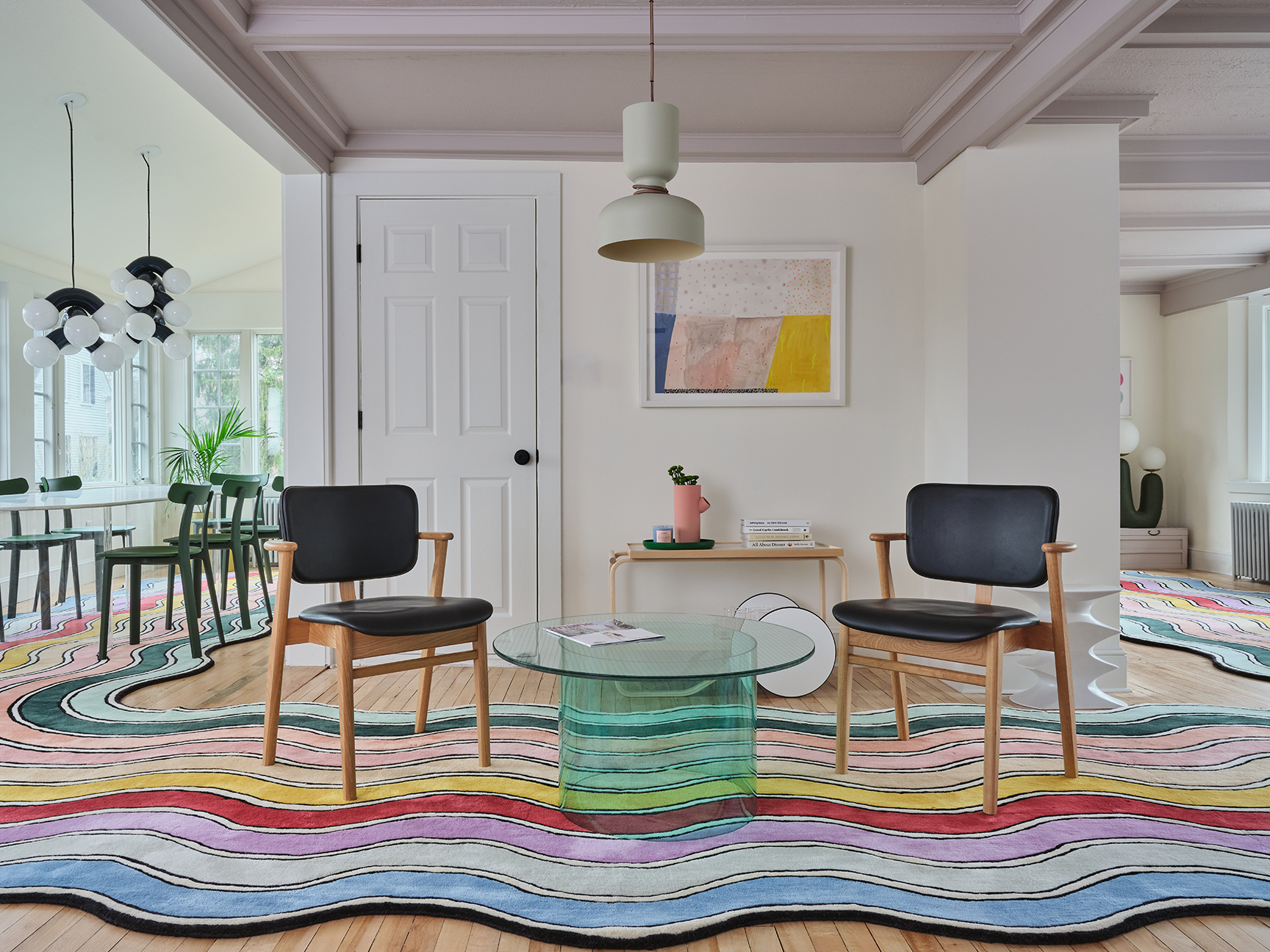 wavy rainbow rug that wraps in a horseshoe