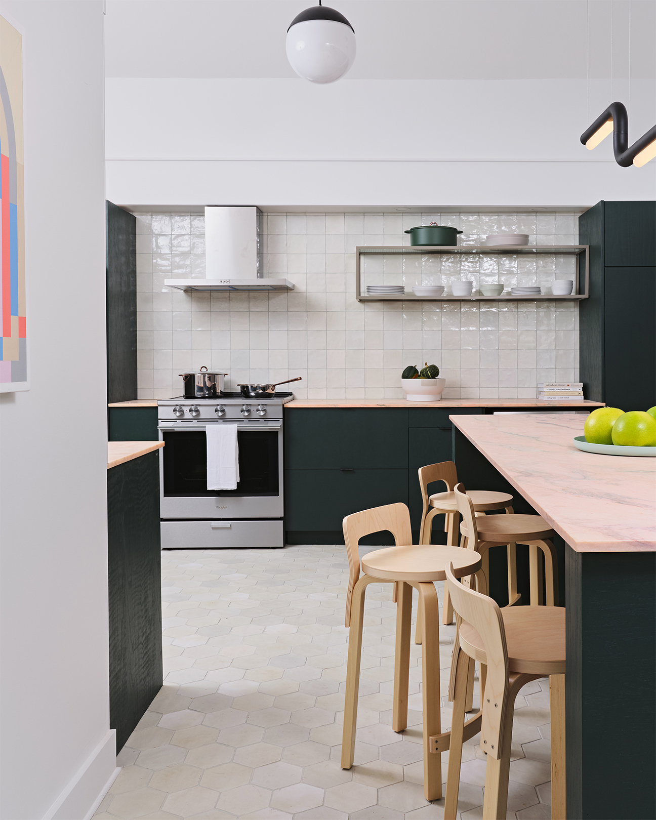 green kitchen with pink counters