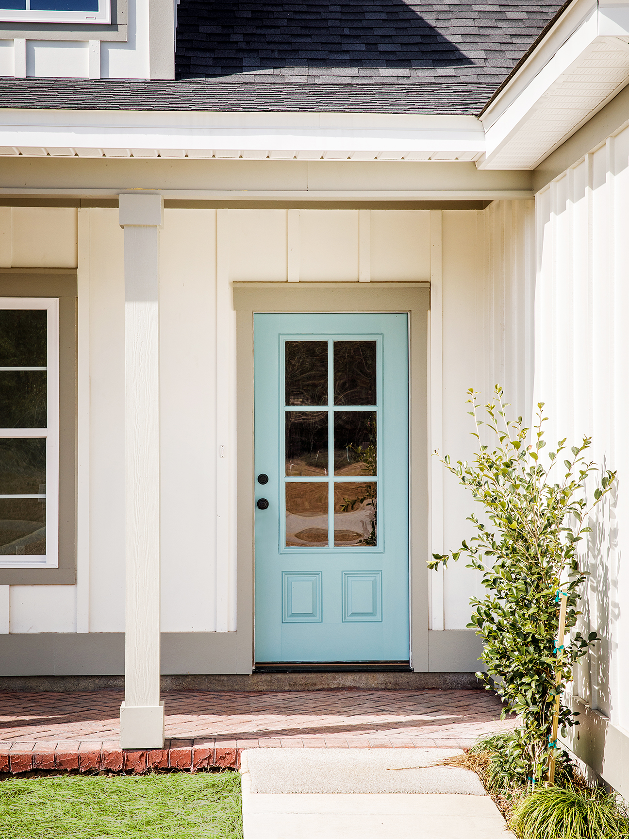 white house with a blue door