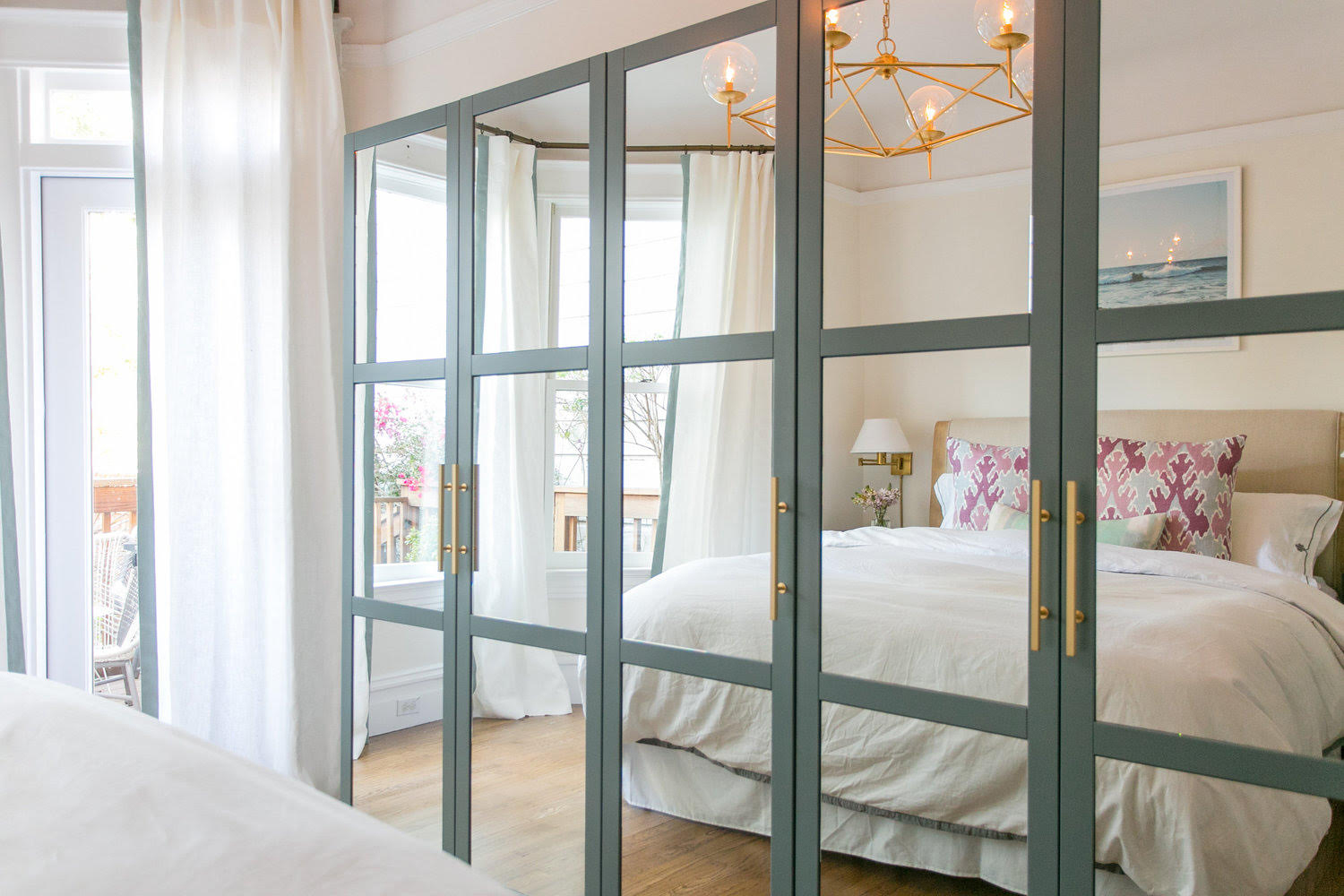 bedroom with mirrored wall