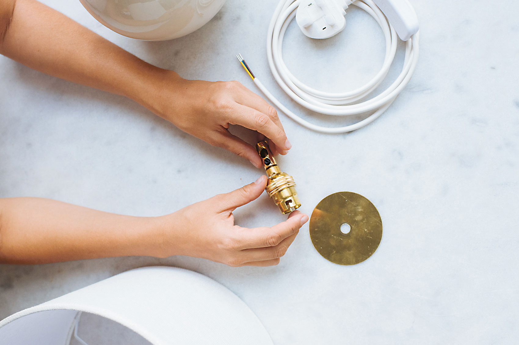 woman holding lamp kit