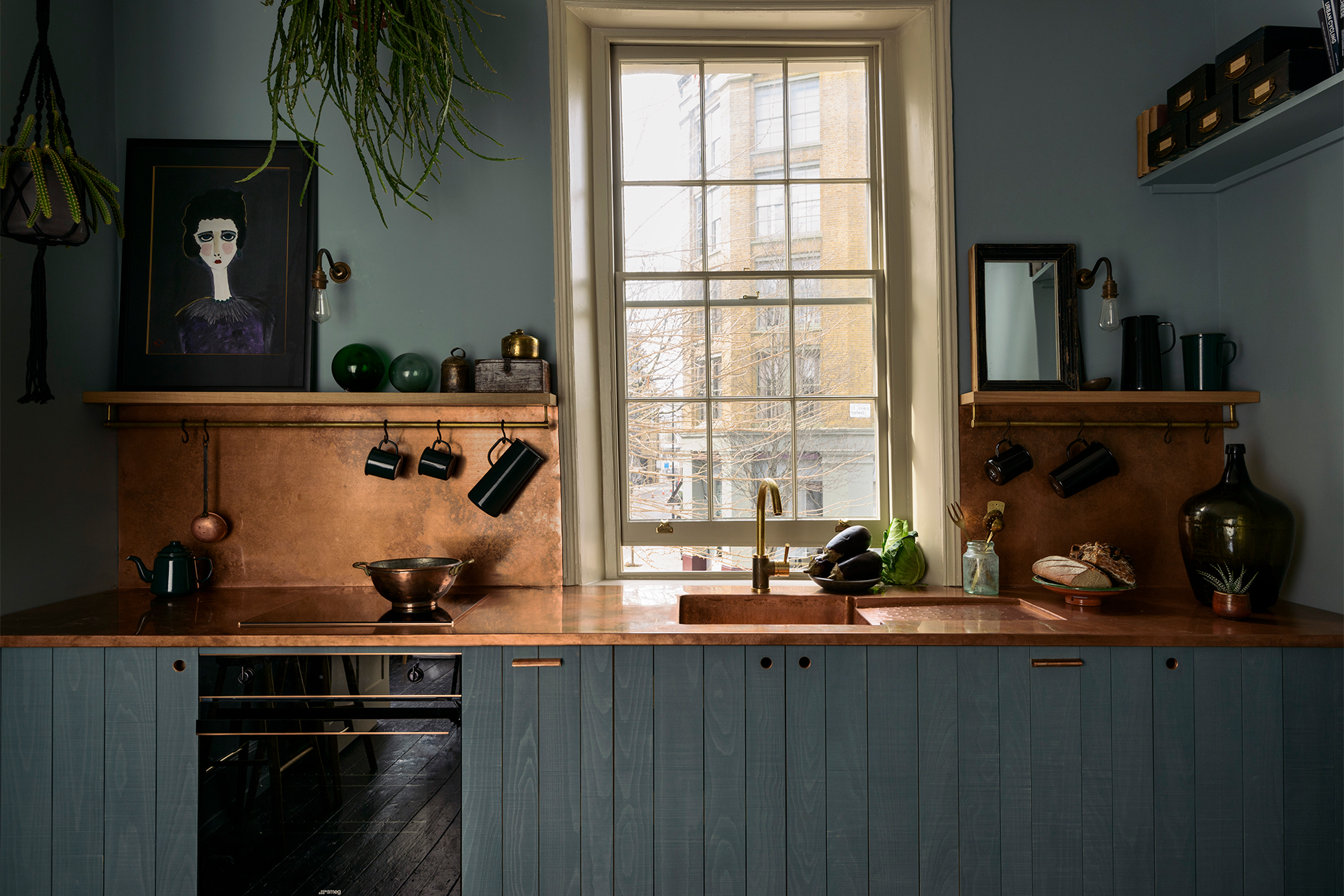 teal kitchen cabinets with copper counter