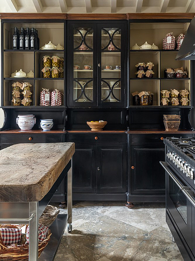 black kitchen with lots of glass doors