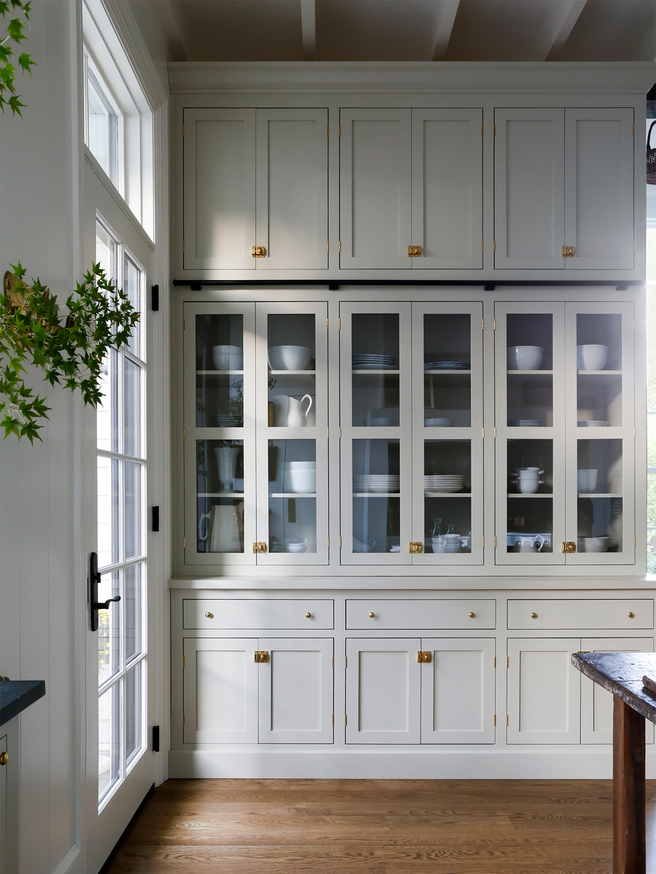 floor to ceiling glass cabinets