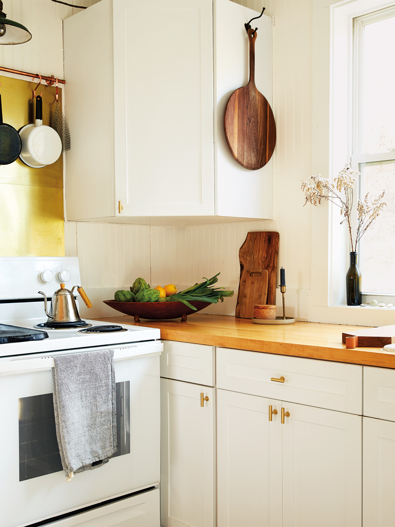 tiny kitchen with butcher block counter