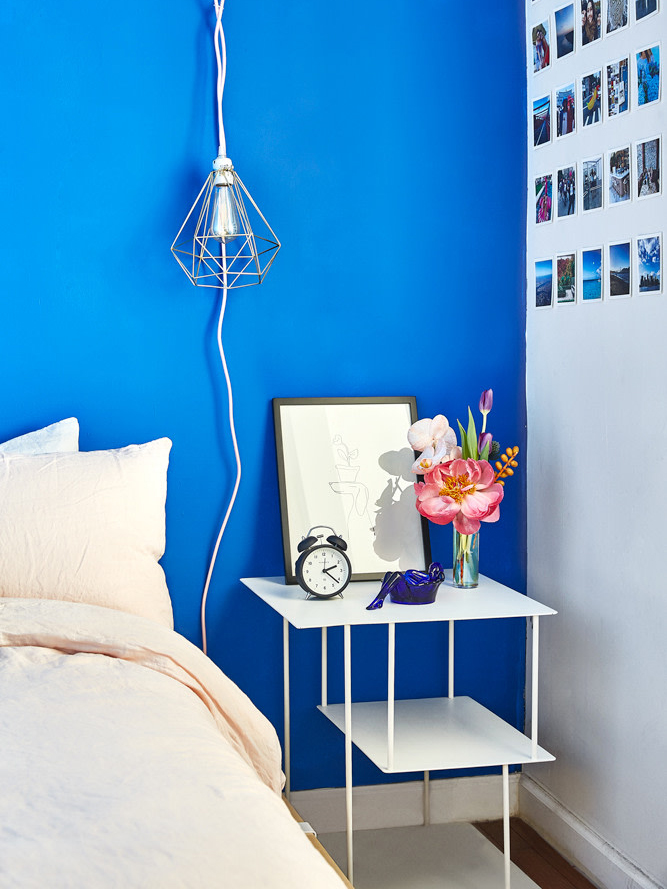 bright blue wall bedroom