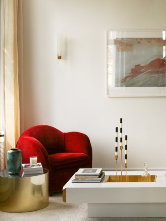 living room nook with red chair