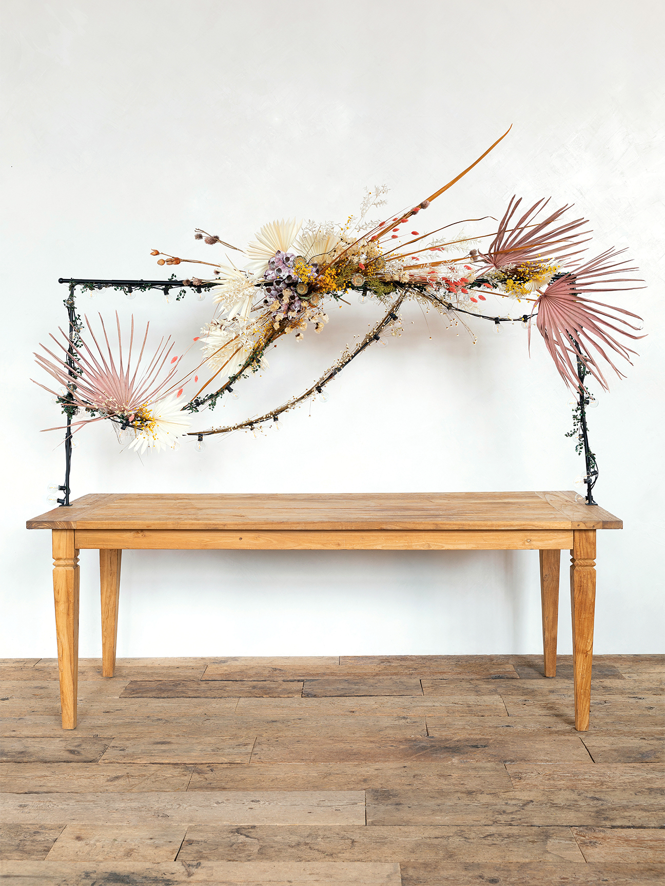 table with floral installation