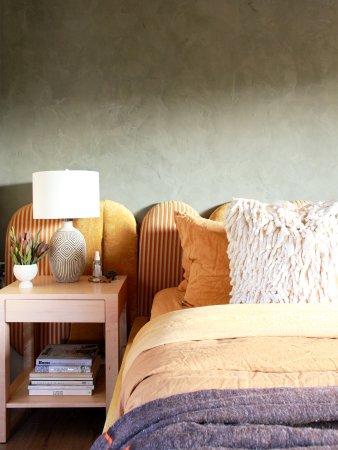 yellow headboard green bedroom