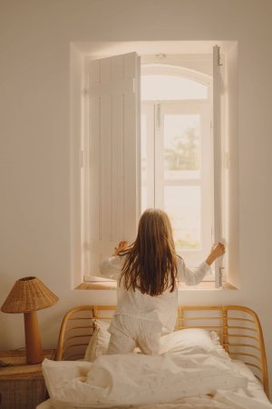 white kids bedroom with rattan bed