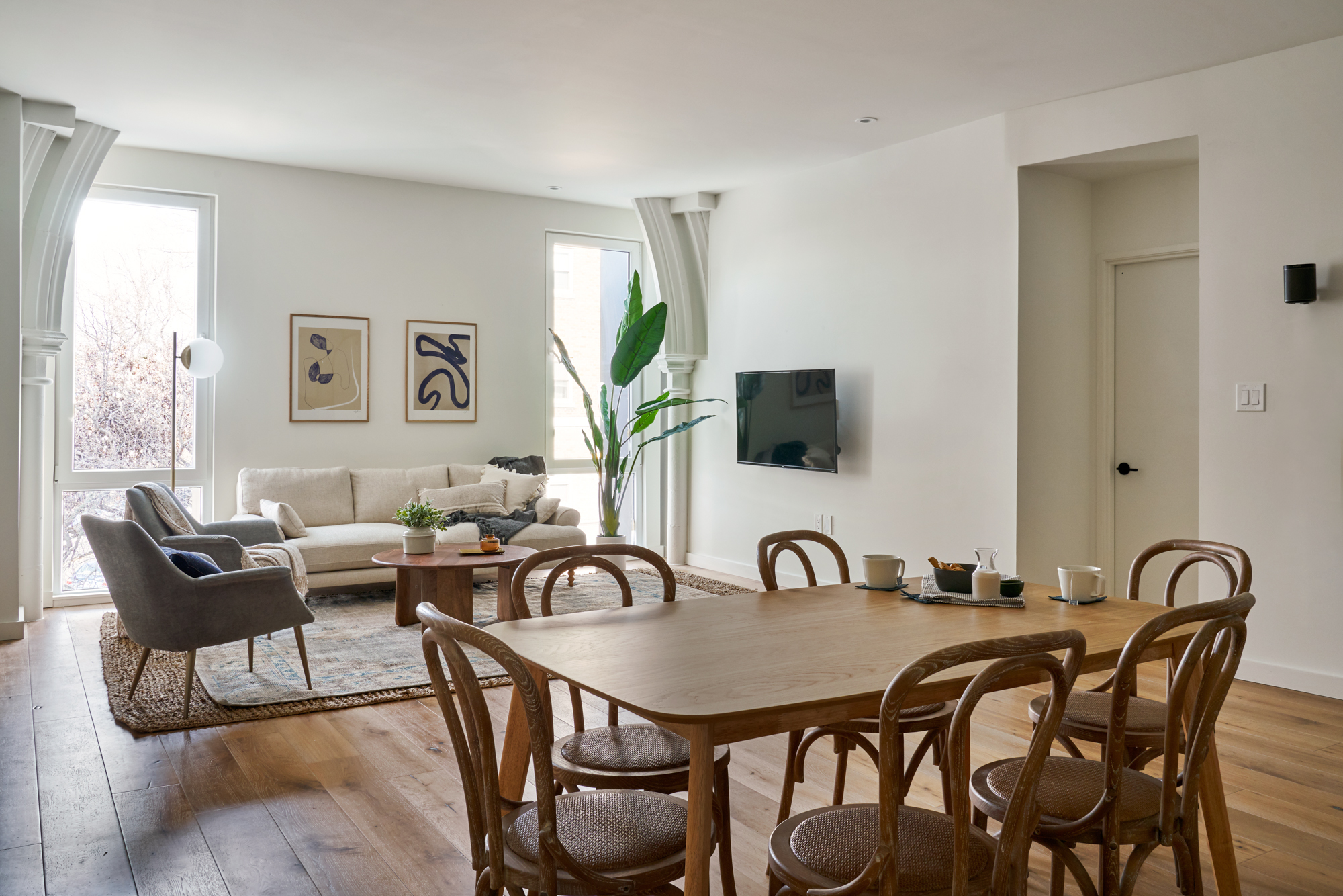 modern open dining room with wood table