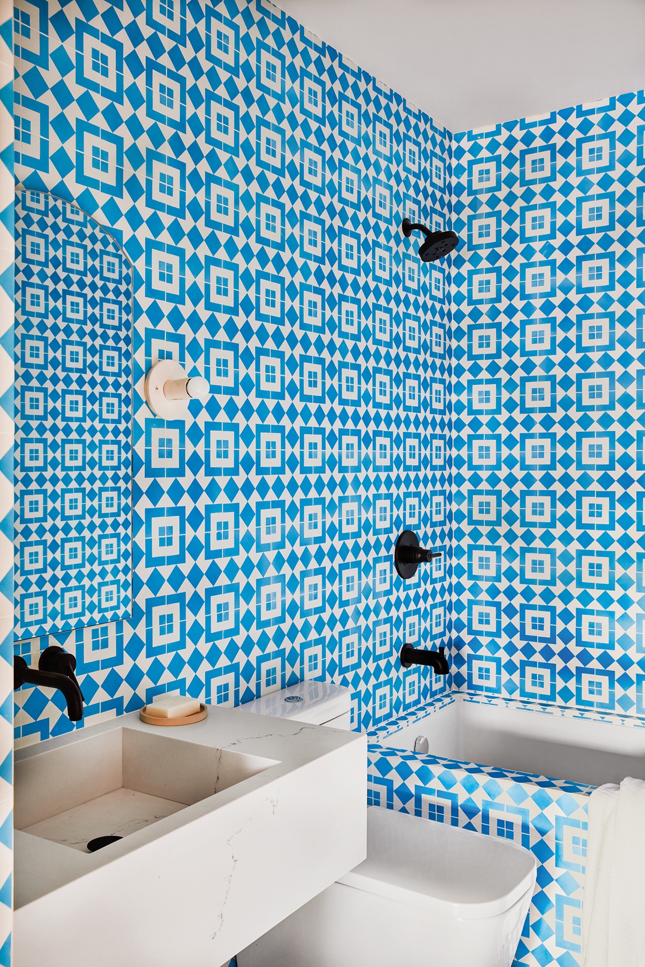 Blue and white tiled bathroom