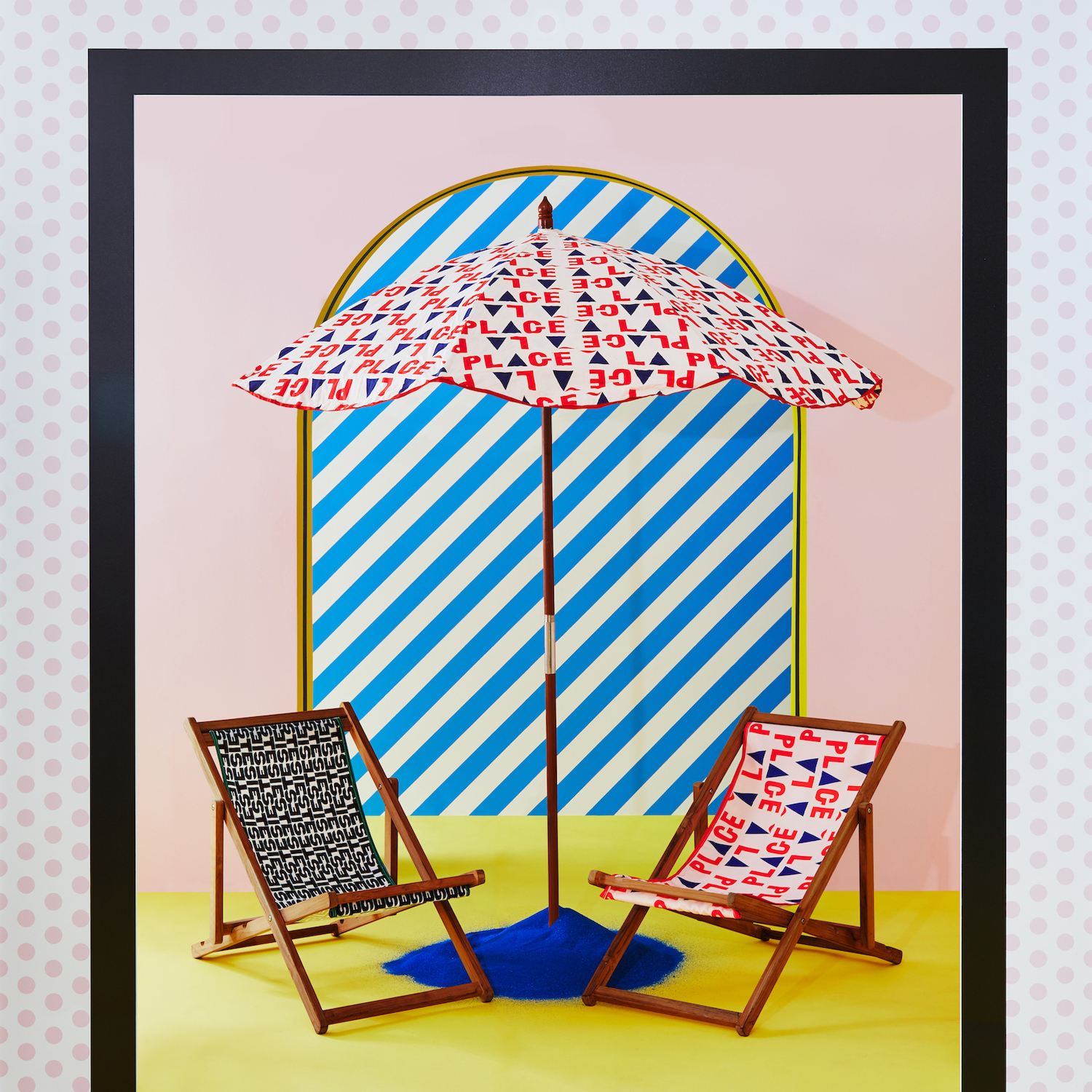 two beach chairs underneath beach umbrella