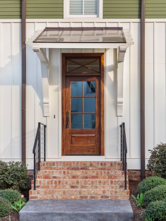 exterior of home with wood door