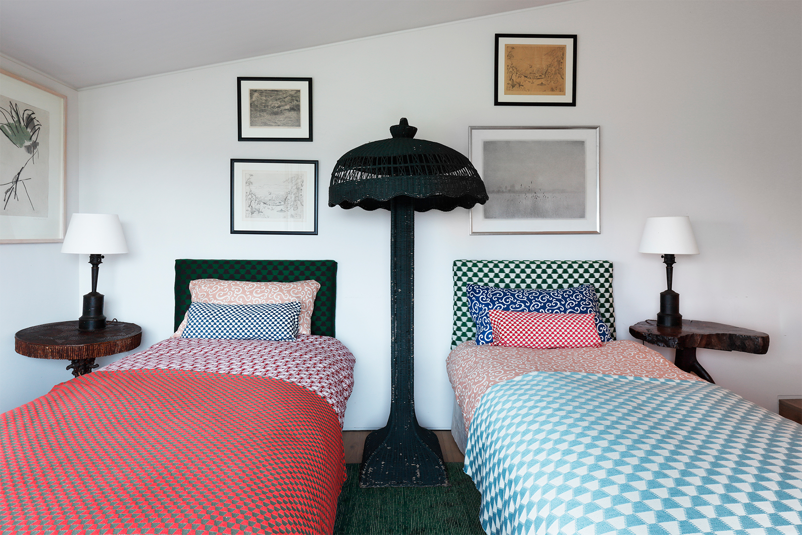 Two beds with mixed-and-matched bedding