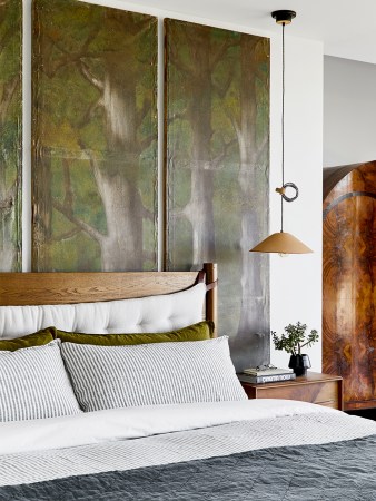 Bedroom with green headboard